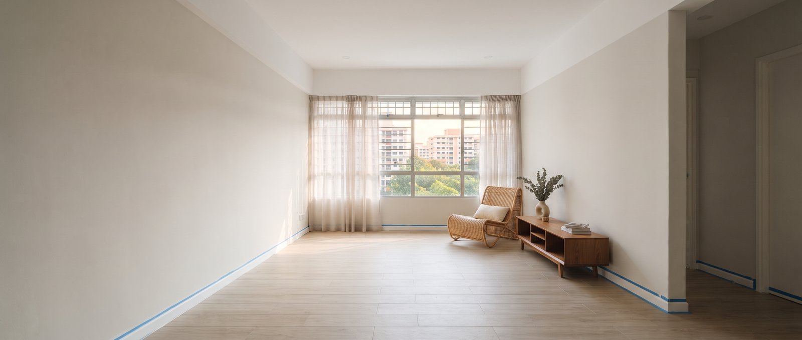Freshly painted living room interior with a clean cut line at the ceiling