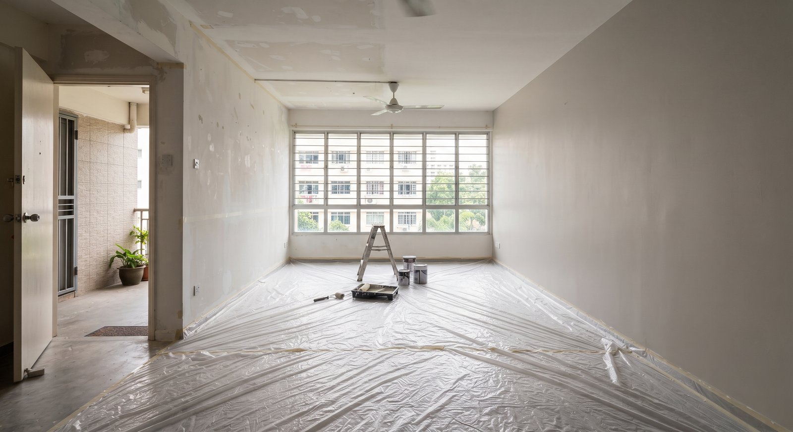 HDB flat living room being repainted